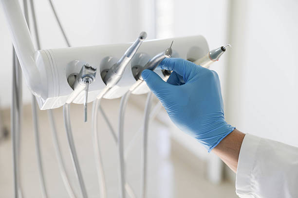 Professional Tooth Extraction technician working in Beach, ND